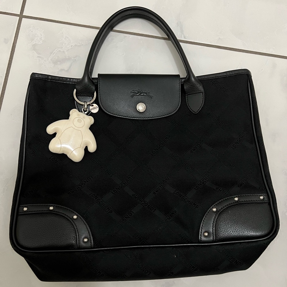 Longchamp bag with a Furla bear